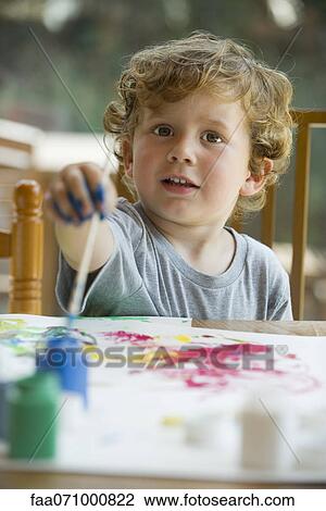 Little boy painting View Large Photo Image Stock Image - Little boy painting. Fotosearch