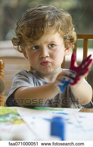 Little boy sulking View Large Photo Image Stock Image - Little boy sulking. Fotosearch