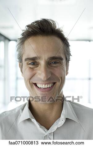 Man smiling, portrait View Large Photo Image Stock Image - Man smiling, portrait. Fotosearch