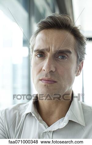 Stock Photo - Man with worried expression. Fotosearch