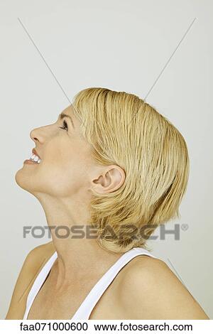 Mid-adult woman, portrait View Large Photo Image Stock Image - Mid-adult woman, portrait. Fotosearch