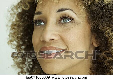 Stock Photo - Mid-adult woman, portrait. Fotosearch