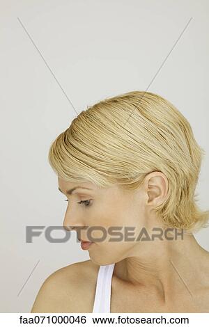 Stock Photograph - Mid-adult woman, portrait. Fotosearch
