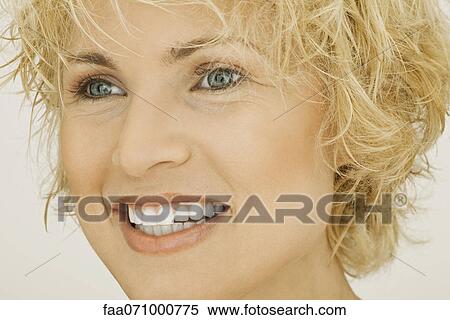 Stock Photography - Mid-adult woman, portrait. Fotosearch