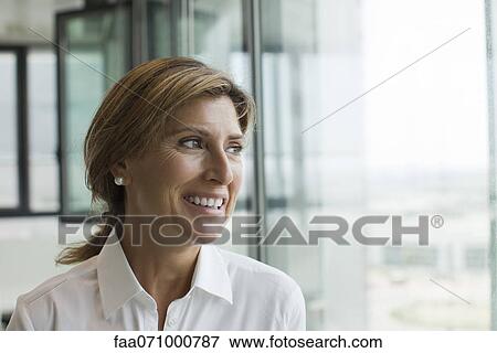 Professional woman smiling View Large Photo Image Stock Photo - Professional woman smiling. Fotosearch