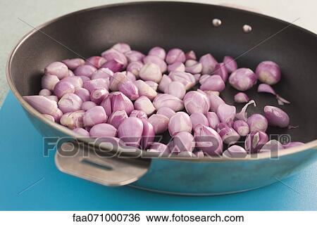 Shallots in pan View Large Photo Image Stock Photograph - Shallots in pan. Fotosearch