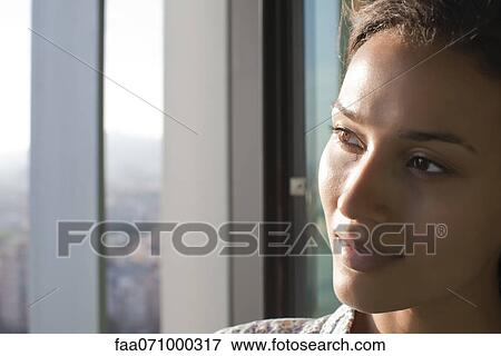 Sunshine on women's face View Large Photo Image Stock Photo - Sunshine on women's face. Fotosearch