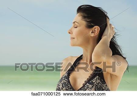 Woman at beach, portrait View Large Photo Image Stock Photography - Woman at beach, portrait. Fotosearch