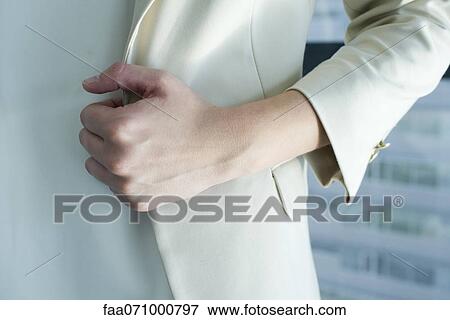 Stock Photo - Woman in suit, cropped. Fotosearch