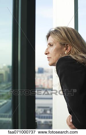 Woman looking at view View Large Photo Image Stock Photo - Woman looking at view. Fotosearch