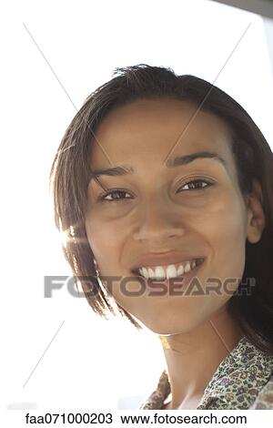 Woman smiling View Large Photo Image Stock Image - Woman smiling. Fotosearch