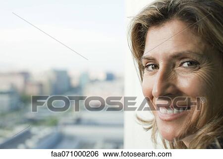 Stock Photograph - Woman smiling. Fotosearch