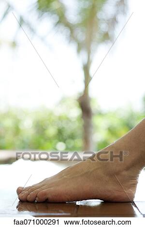 Stock Image - Woman's foot, close-up. Fotosearch