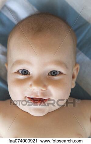 Baby smiling at camera, portrait View Large Photo Image Stock Image - Baby smiling at camera, portrait. Fotosearch