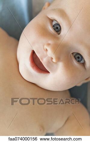 Baby smiling at camera, portrait View Large Photo Image Stock Photograph - Baby smiling at camera, portrait. Fotosearch