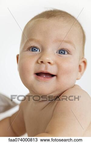 Baby smiling, portrait View Large Photo Image Stock Image - Baby smiling, portrait. Fotosearch