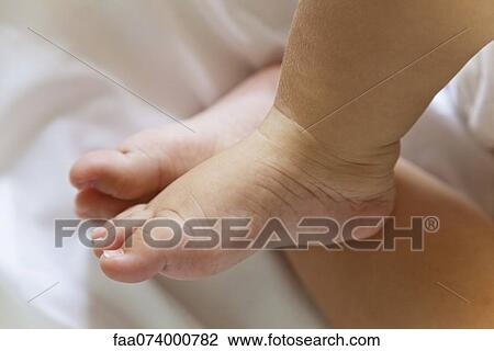 Baby's bare feet View Large Photo Image Stock Image - Baby's bare feet. Fotosearch