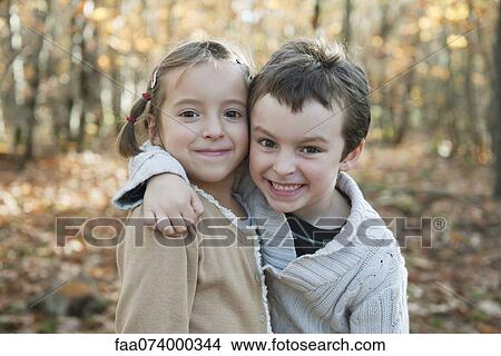 Brother and sister in nature View Large Photo Image Picture - Brother and sister in nature. Fotosearch