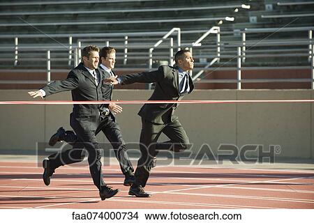 Businessmen approaching finish line in race View Large Photo Image Picture - Businessmen approaching finish line in race. Fotosearch