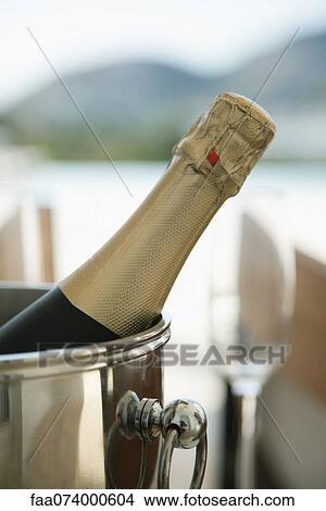 Champagne in ice bucket View Large Photo Image Picture - Champagne in ice bucket. Fotosearch