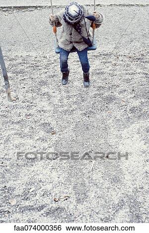 Child on swing View Large Photo Image Stock Photograph - Child on swing. Fotosearch