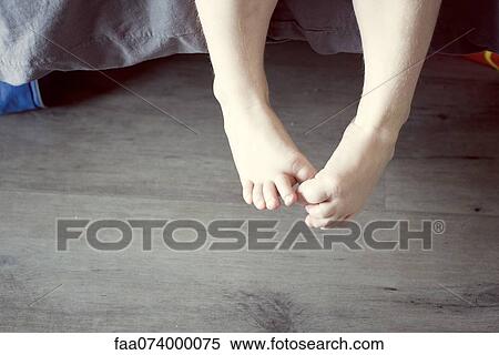 Child's dangling bare feet View Large Photo Image Stock Photography - Child's dangling bare feet. Fotosearch