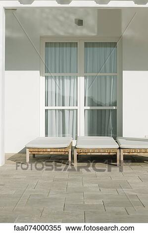Deckchairs in a row View Large Photo Image Stock Photography - Deckchairs in a row. Fotosearch