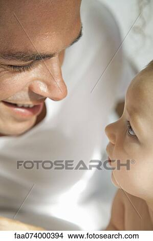 Father bonding with baby View Large Photo Image Picture - Father bonding with baby. Fotosearch