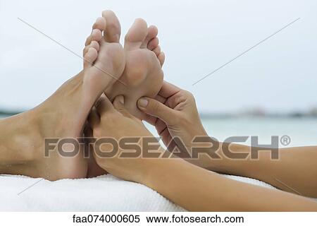 Stock Photography - Foot massage. Fotosearch