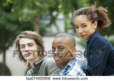 Friends hanging out, portrait View Large Photo Image Stock Photo - Friends hanging out, portrait. Fotosearch
