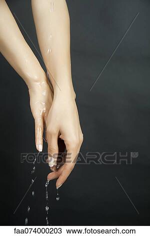 Hands under running water View Large Photo Image Stock Image - Hands under running water. Fotosearch
