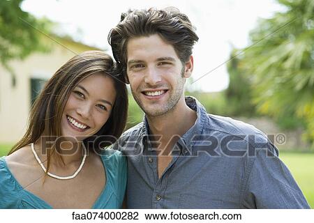 Happy young couple, portrait View Large Photo Image Stock Image - Happy young couple, portrait. Fotosearch