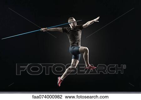 Male athlete leaping with javelin View Large Photo Image Stock Image - Male athlete leaping with javelin. Fotosearch