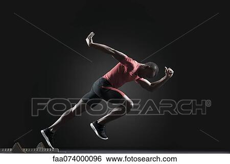 Male athlete leaving starting block View Large Photo Image Stock Photograph - Male athlete leaving starting block. Fotosearch