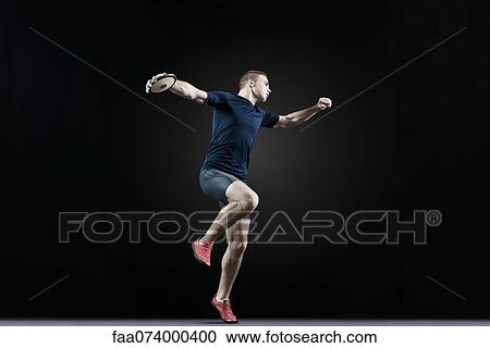 Male athlete throwing discus View Large Photo Image Stock Image - Male athlete throwing discus. Fotosearch