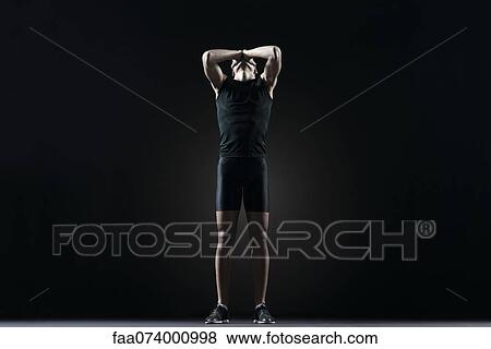 Male athlete with hands covering eyes View Large Photo Image Stock Photo - Male athlete with hands covering eyes. Fotosearch