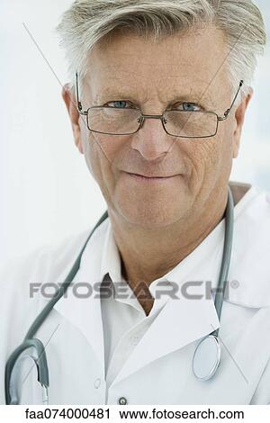 Male doctor, portrait View Large Photo Image Stock Image - Male doctor, portrait. Fotosearch