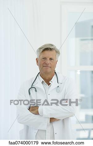 Male doctor, portrait View Large Photo Image Stock Photo - Male doctor, portrait. Fotosearch