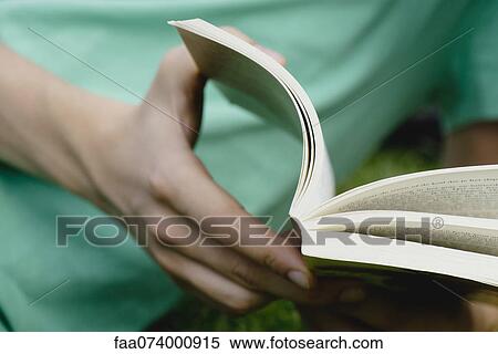 Man reading book, close-up View Large Photo Image Stock Photography - Man reading book, close-up. Fotosearch