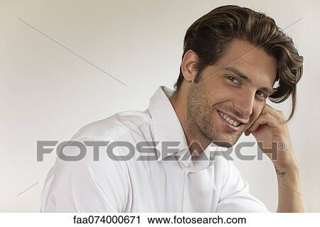 Man smiling, portrait View Large Photo Image Stock Image - Man smiling, portrait. Fotosearch