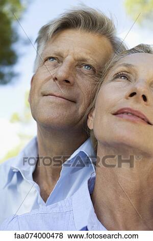 Mature couple outdoors, portrait View Large Photo Image Stock Photo - Mature couple outdoors, portrait. Fotosearch