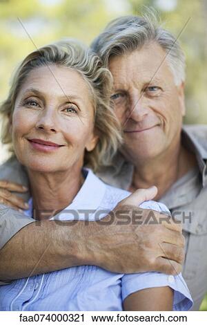 Stock Image - Mature couple, portrait. Fotosearch