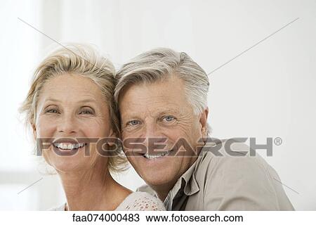 Stock Image - Mature couple, portrait. Fotosearch
