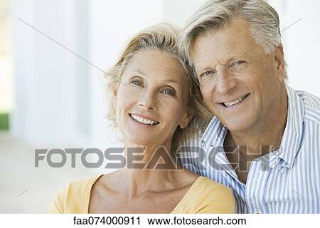 Stock Image - Mature couple, portrait. Fotosearch