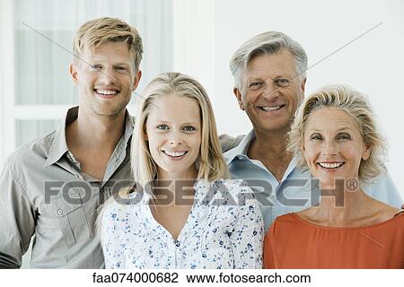 Mature parents with their adult son and daughter, portrait View Large Photo Image Stock Image - Mature parents with their adult son and daughter, portrait. Fotosearch