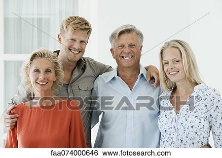Mature parents with their adult son and daughter, portrait View Large Photo Image Stock Photograph - Mature parents with their adult son and daughter, portrait. Fotosearch