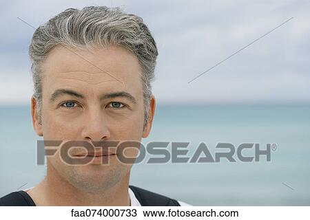 Mid-adult man, portrait View Large Photo Image Stock Image - Mid-adult man, portrait. Fotosearch