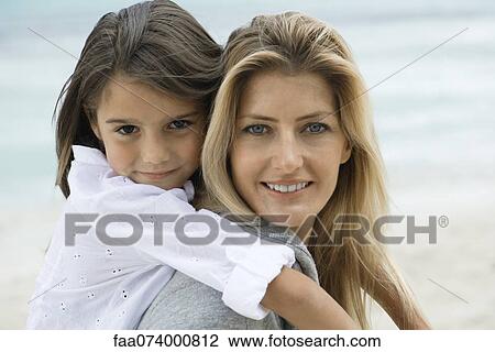 Stock Image - Mother and daughter, portrait. Fotosearch