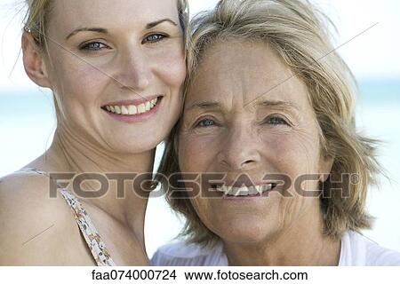 Picture - Mother with adult daughter, portrait. Fotosearch