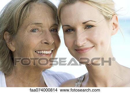 Picture - Mother with adult daughter, portrait. Fotosearch